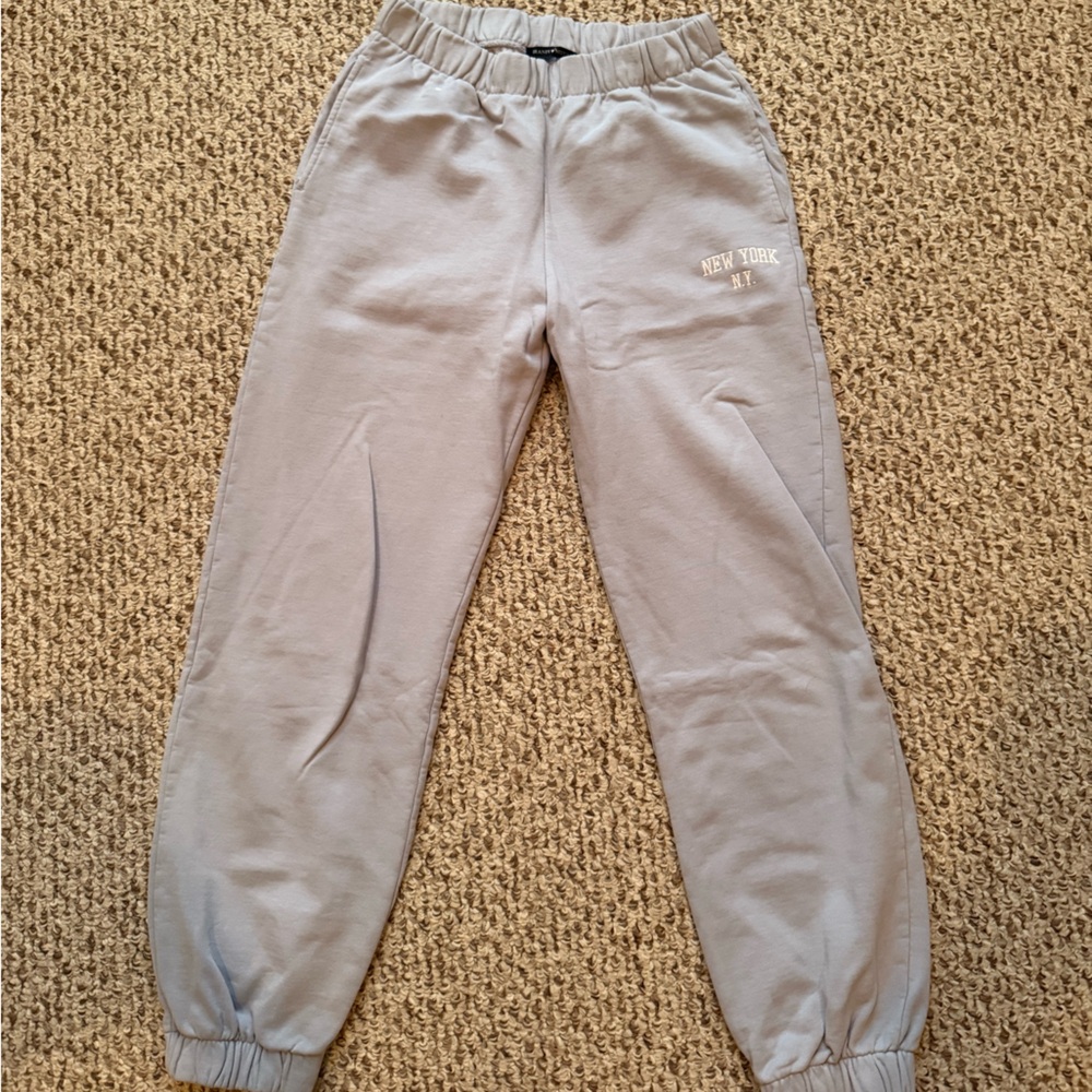 brandy melville sweat pants. light blue "new york"